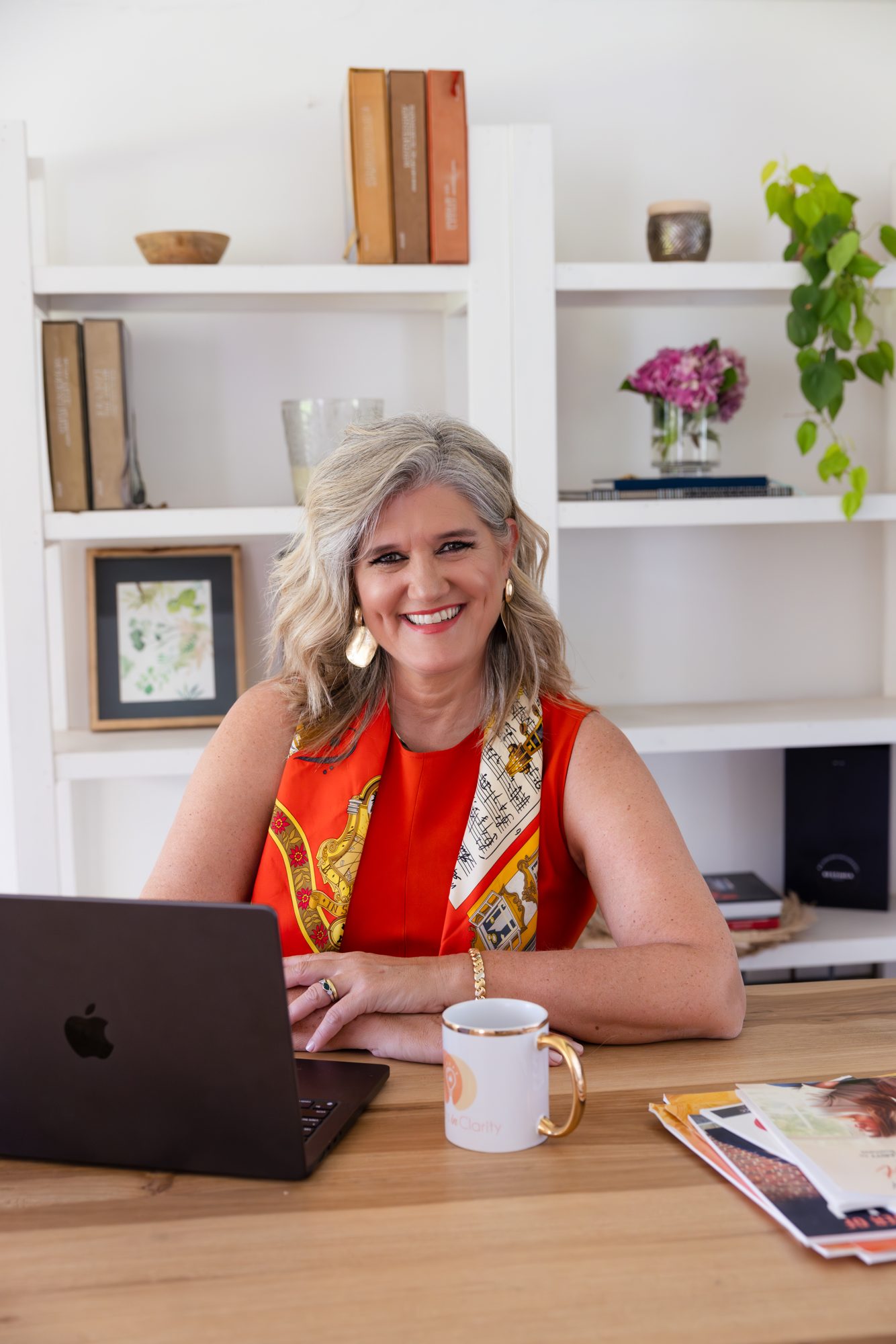 Dolores Hirschmann at her desk preparing client work